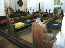 St Nicholas' church pews showing missing finials Finials